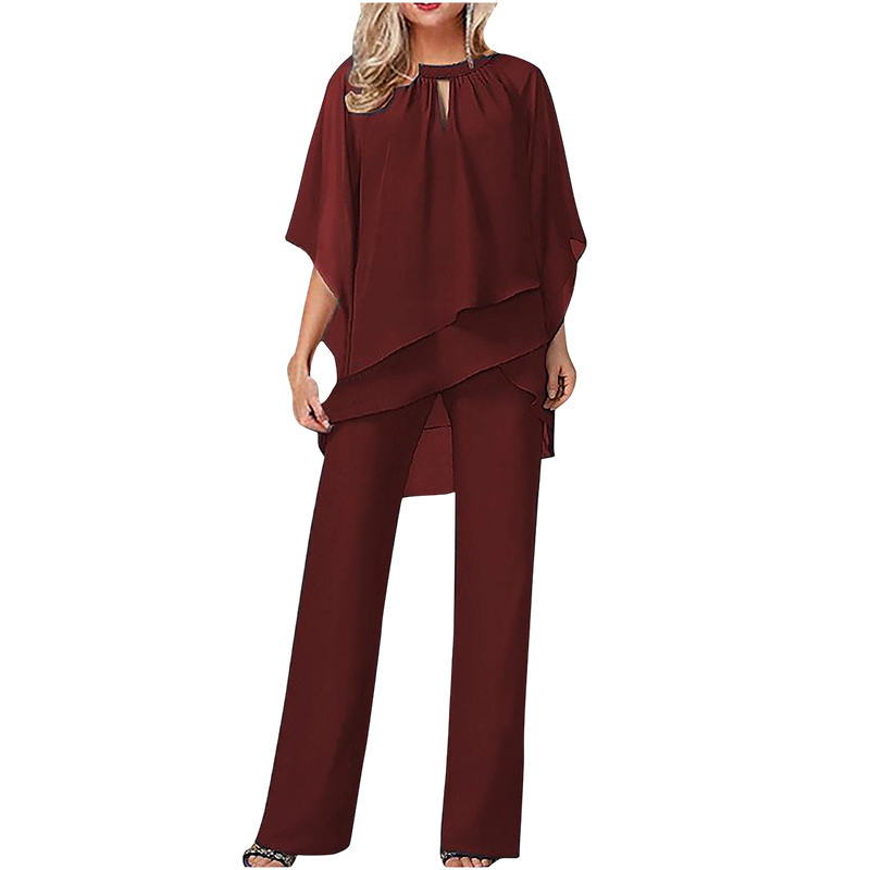 Elegante completo di pantaloni asimmetrici in due pezzi